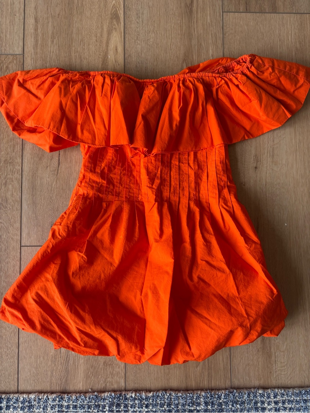 PrettyLittleThing Orange Off-Shoulder Bubble Hem Mini Dress